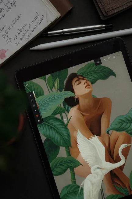 Woman using smartphone for online shopping with credit card in hand, festive background lighting.